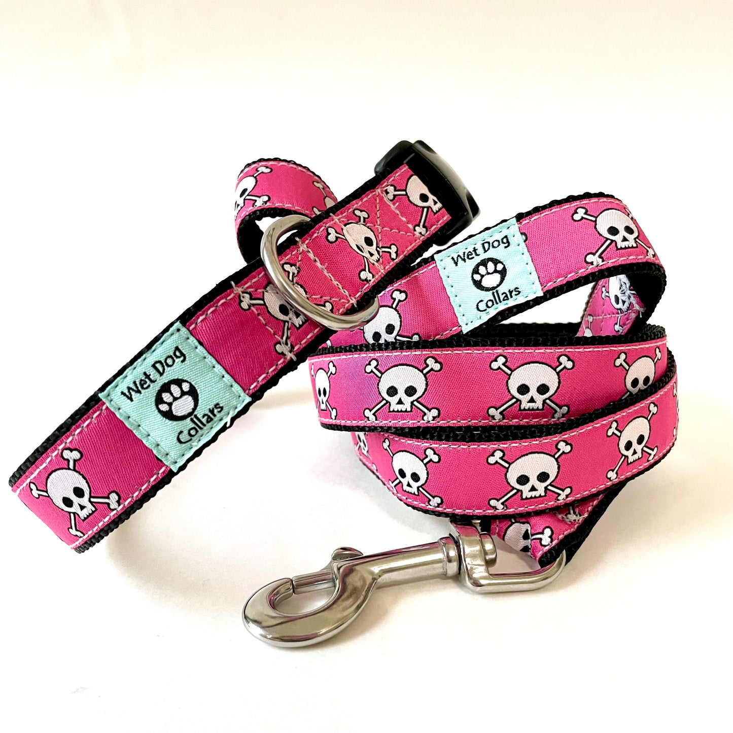 Pink dog leash and collar with skull pattern. Stainless steel hardware for the coastal environment
