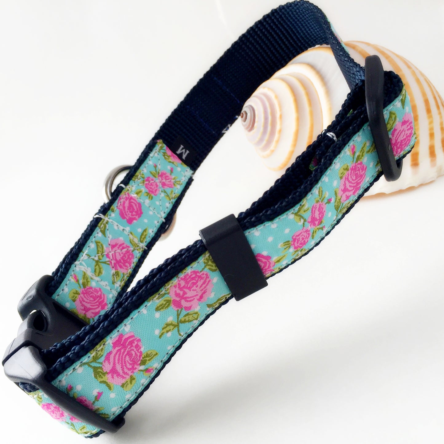 Dog collar with floral rose pattern on a aqua  background for saltwater dog